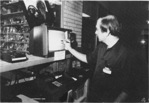 CRAIG ANDERSON demonstrates the lite pen he researched and built. It works amazingly well, and Brett Bilbrey wrote some software to boot the Arcade into a high-speed mode to read the data as fast as the lite pen can supply it.